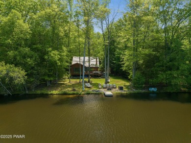 Welcome to your serene lakeside retreat in the highly desirable on Paupack Hills Golf and Country Club in Pennsylvania - for sale on GolfHomes.com, golf home, golf lot