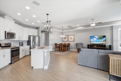 Nearly new pond-view home in the gated River Wilderness Golf & on River Wilderness Golf and Country Club in Florida - for sale on GolfHomes.com, golf home, golf lot