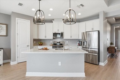 Nearly new pond-view home in the gated River Wilderness Golf & on River Wilderness Golf and Country Club in Florida - for sale on GolfHomes.com, golf home, golf lot