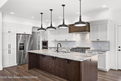 Step into Elevated Living at The Teton Reserve. Positioned along on Teton Reserve in Idaho - for sale on GolfHomes.com, golf home, golf lot