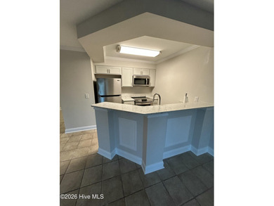 Move In Ready!! Beautifully updated first-floor, one-bedroom on Brunswick Plantation and Golf Resorts in North Carolina - for sale on GolfHomes.com, golf home, golf lot