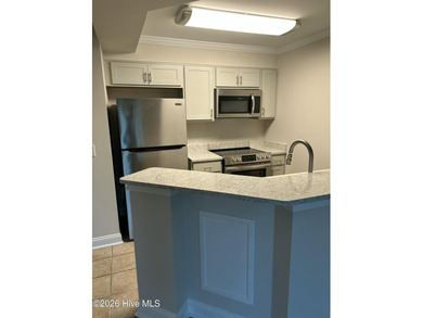 Move In Ready!! Beautifully updated first-floor, one-bedroom on Brunswick Plantation and Golf Resorts in North Carolina - for sale on GolfHomes.com, golf home, golf lot