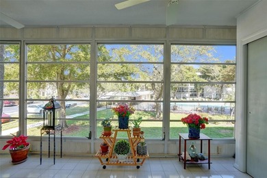 Renovated CORNER 2 bed/2 bath 1291 sq. ft residence located in on Wynmoor Golf Course in Florida - for sale on GolfHomes.com, golf home, golf lot