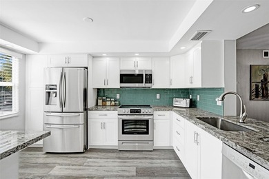 Renovated CORNER 2 bed/2 bath 1291 sq. ft residence located in on Wynmoor Golf Course in Florida - for sale on GolfHomes.com, golf home, golf lot