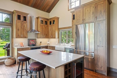 Luxury Golf  Tennis cabin overlooking open space with Cottonwood on Jackson Hole Golf and Tennis Club in Wyoming - for sale on GolfHomes.com, golf home, golf lot