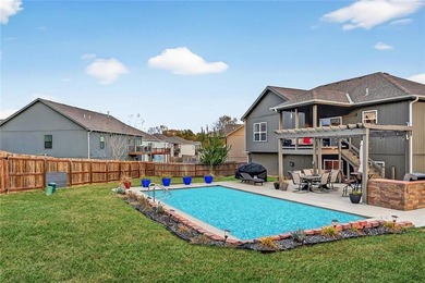 Set in Rollins Landing, this 5 Bedroom, 3 Bathroom home blends on Paradise Pointe Golf Complex in Missouri - for sale on GolfHomes.com, golf home, golf lot