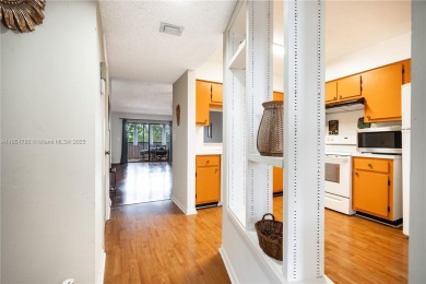 Step into this spacious and beautifully maintained 2-br, 2-ba on Palm-Aire Country Club and Resort - Palms in Florida - for sale on GolfHomes.com, golf home, golf lot