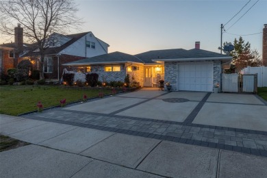 Welcome To This Beautifully Updated 3-Bedroom, 2-Bathroom Ranch on Middle Bay Country Club in New York - for sale on GolfHomes.com, golf home, golf lot