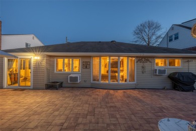 Welcome To This Beautifully Updated 3-Bedroom, 2-Bathroom Ranch on Middle Bay Country Club in New York - for sale on GolfHomes.com, golf home, golf lot