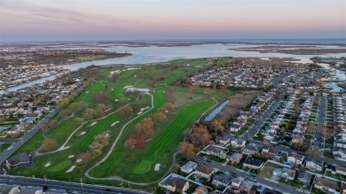 Welcome To This Beautifully Updated 3-Bedroom, 2-Bathroom Ranch on Middle Bay Country Club in New York - for sale on GolfHomes.com, golf home, golf lot