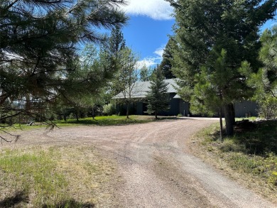 Delightfully unique this  5.33 Acre parcel known as *Pinocchio on Double Arrow Lodge in Montana - for sale on GolfHomes.com, golf home, golf lot
