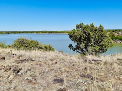 Amazing property sitting directly on White Mountain Lake with on Juniper Ridge R.V. Golf Resort in Arizona - for sale on GolfHomes.com, golf home, golf lot