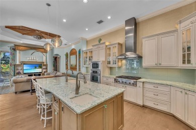 Experience the pinnacle of refined Florida living in this on University Park Country Club in Florida - for sale on GolfHomes.com, golf home, golf lot