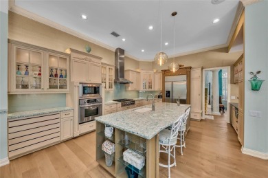 Experience the pinnacle of refined Florida living in this on University Park Country Club in Florida - for sale on GolfHomes.com, golf home, golf lot