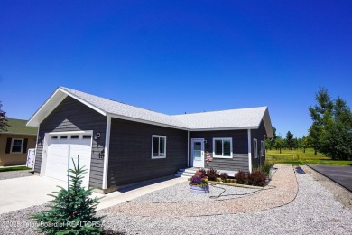 Adorable golf course home located in Stewart Country Club on Star Valley RV Golf Course in Wyoming - for sale on GolfHomes.com, golf home, golf lot