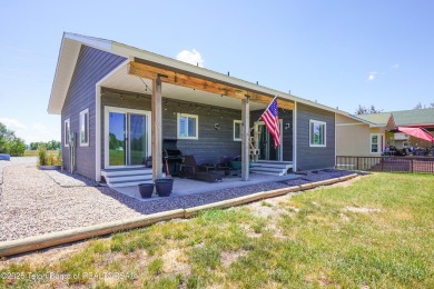 Adorable golf course home located in Stewart Country Club on Star Valley RV Golf Course in Wyoming - for sale on GolfHomes.com, golf home, golf lot