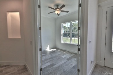 One or more photos are virtually staged. Seller is Very on Pine Ridge Community Golf and Country Club in Florida - for sale on GolfHomes.com, golf home, golf lot