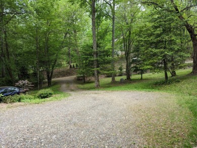 Charming Home in sought-after Tahlequah Ridge Subdivision on Chatuge Shores Golf Course in North Carolina - for sale on GolfHomes.com, golf home, golf lot