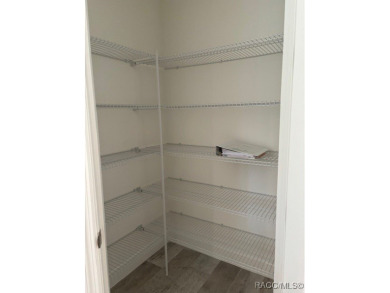 One or more photos are virtually staged. Seller is Very on Pine Ridge Community Golf and Country Club in Florida - for sale on GolfHomes.com, golf home, golf lot