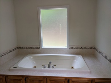 Charming Home in sought-after Tahlequah Ridge Subdivision on Chatuge Shores Golf Course in North Carolina - for sale on GolfHomes.com, golf home, golf lot