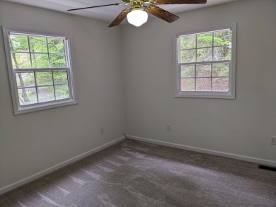 Charming Home in sought-after Tahlequah Ridge Subdivision on Chatuge Shores Golf Course in North Carolina - for sale on GolfHomes.com, golf home, golf lot