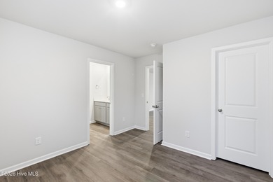 Welcome to The Givens-a thoughtfully designed new construction on Harbour Point Golf Club in North Carolina - for sale on GolfHomes.com, golf home, golf lot