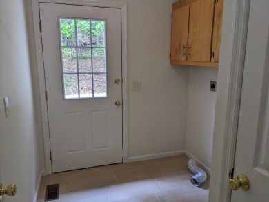 Charming Home in sought-after Tahlequah Ridge Subdivision on Chatuge Shores Golf Course in North Carolina - for sale on GolfHomes.com, golf home, golf lot