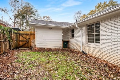 Welcome home to this charming three-bedroom, one bath bungalow on East Lake Golf Club in Georgia - for sale on GolfHomes.com, golf home, golf lot