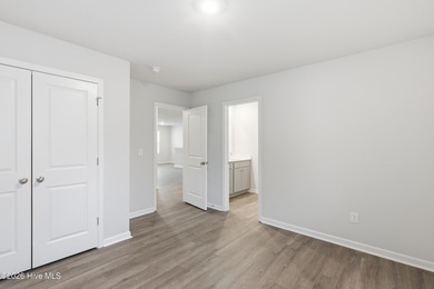 Welcome to The Givens-a thoughtfully designed new construction on Harbour Point Golf Club in North Carolina - for sale on GolfHomes.com, golf home, golf lot