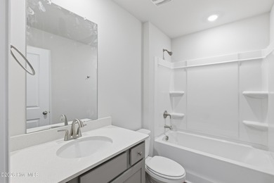 Welcome to The Givens-a thoughtfully designed new construction on Harbour Point Golf Club in North Carolina - for sale on GolfHomes.com, golf home, golf lot