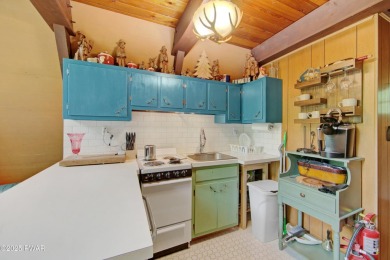 ESCAPE TO THE POCONO MOUNTAINS AND DISCOVER THIS CHARMING RUSTIC on Lords Valley Country Club, Inc in Pennsylvania - for sale on GolfHomes.com, golf home, golf lot