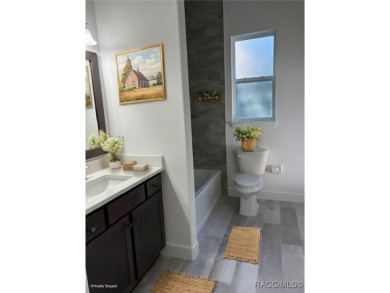 One or more photos are virtually staged. Seller is Very on Pine Ridge Community Golf and Country Club in Florida - for sale on GolfHomes.com, golf home, golf lot