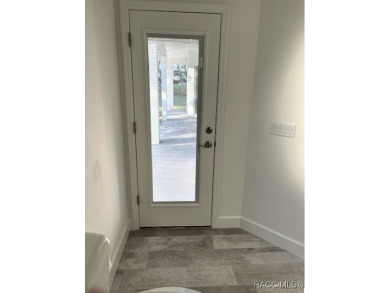 One or more photos are virtually staged. Seller is Very on Pine Ridge Community Golf and Country Club in Florida - for sale on GolfHomes.com, golf home, golf lot