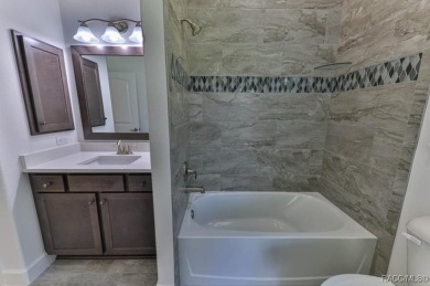 One or more photos are virtually staged. Seller is Very on Pine Ridge Community Golf and Country Club in Florida - for sale on GolfHomes.com, golf home, golf lot