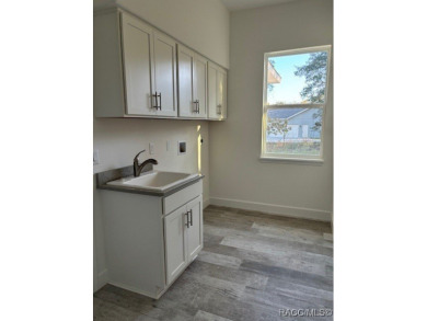 One or more photos are virtually staged. Seller is Very on Pine Ridge Community Golf and Country Club in Florida - for sale on GolfHomes.com, golf home, golf lot