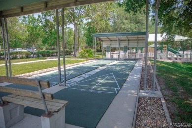 One or more photos are virtually staged. Seller is Very on Pine Ridge Community Golf and Country Club in Florida - for sale on GolfHomes.com, golf home, golf lot
