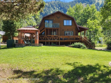 Your dream cabin in the woods awaits you.  Built by the original on Star Valley RV Golf Course in Wyoming - for sale on GolfHomes.com, golf home, golf lot