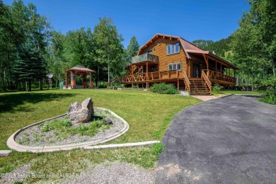Your dream cabin in the woods awaits you.  Built by the original on Star Valley RV Golf Course in Wyoming - for sale on GolfHomes.com, golf home, golf lot