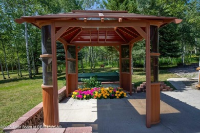Your dream cabin in the woods awaits you.  Built by the original on Star Valley RV Golf Course in Wyoming - for sale on GolfHomes.com, golf home, golf lot