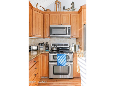 3BR/2.5BA Ocean-facing villa with unobstructed views of the on Bald Head Island Golf Club in North Carolina - for sale on GolfHomes.com, golf home, golf lot