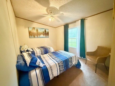 This spacious 4-bedroom, 2.5-bath home sits on a large corner on Pendleton Harbor in Texas - for sale on GolfHomes.com, golf home, golf lot