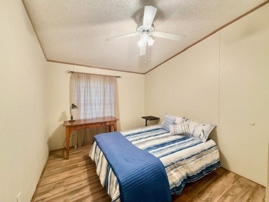 This spacious 4-bedroom, 2.5-bath home sits on a large corner on Pendleton Harbor in Texas - for sale on GolfHomes.com, golf home, golf lot