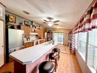 This spacious 4-bedroom, 2.5-bath home sits on a large corner on Pendleton Harbor in Texas - for sale on GolfHomes.com, golf home, golf lot