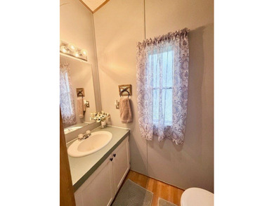 This spacious 4-bedroom, 2.5-bath home sits on a large corner on Pendleton Harbor in Texas - for sale on GolfHomes.com, golf home, golf lot