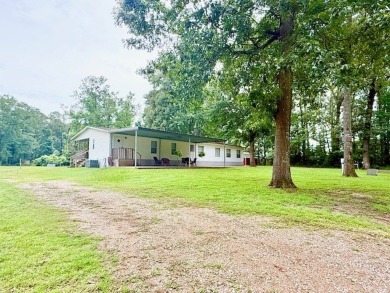 This spacious 4-bedroom, 2.5-bath home sits on a large corner on Pendleton Harbor in Texas - for sale on GolfHomes.com, golf home, golf lot