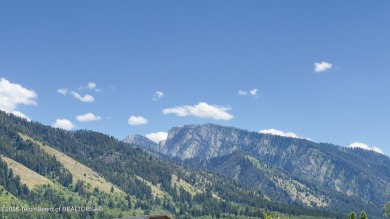 Flat and ready for your dream home! This .69-acre lot offers on Star Valley RV Golf Course in Wyoming - for sale on GolfHomes.com, golf home, golf lot