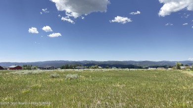 Flat and ready for your dream home! This .69-acre lot offers on Star Valley RV Golf Course in Wyoming - for sale on GolfHomes.com, golf home, golf lot