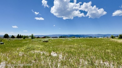 Flat and ready for your dream home! This .69-acre lot offers on Star Valley RV Golf Course in Wyoming - for sale on GolfHomes.com, golf home, golf lot