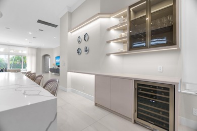 Immaculate, completely renovated MOVE IN READY 4 bedrooms, 4 on Addison Reserve in Florida - for sale on GolfHomes.com, golf home, golf lot