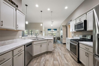 OVERSIZED GARAGE with room for a golf cart! BRAND NEW POOL! 7 on Pennbrooke Fairways in Florida - for sale on GolfHomes.com, golf home, golf lot